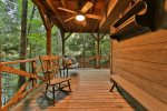 Terrace level covered deck swing